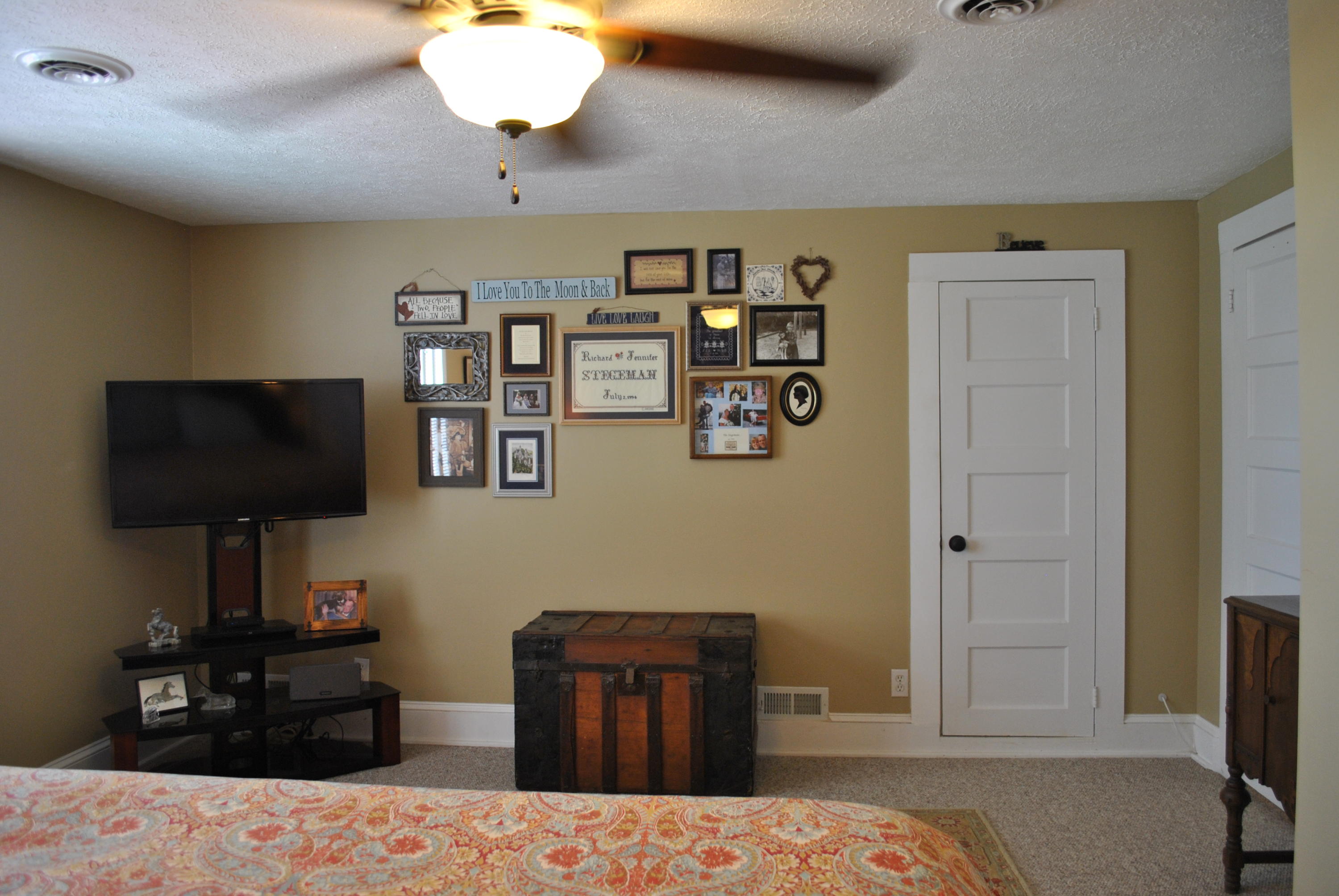 1330 Huffville Road Northeast Pilot, VA 24138 - Photo 77 of 100 a bedroom with a bed and a flat screen tv