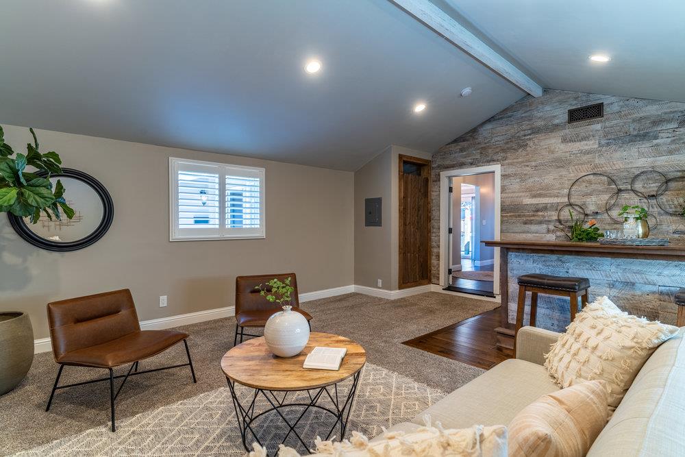 14832 Acton Drive San Jose, CA 95124 - Photo 23 of 47 a living room with furniture and a fireplace