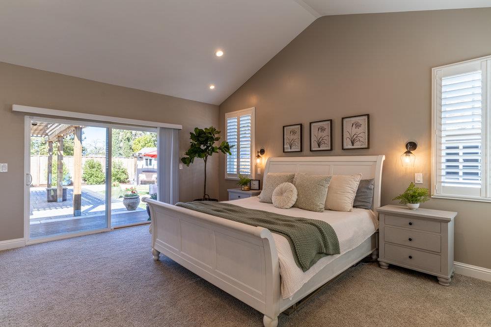 14832 Acton Drive San Jose, CA 95124 - Photo 32 of 47 a bedroom with a bed and a large window