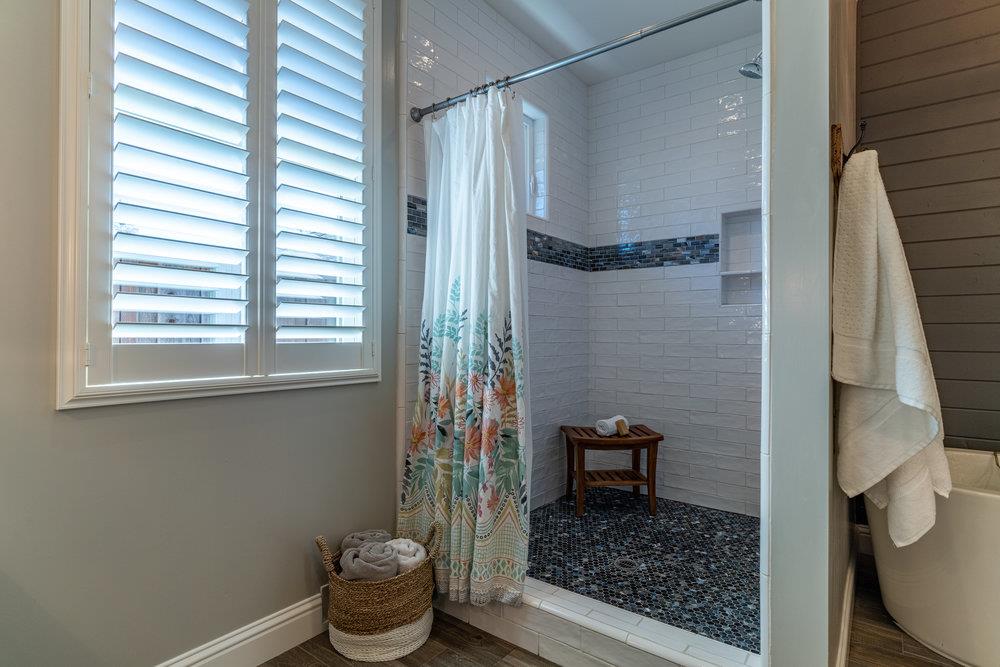 14832 Acton Drive San Jose, CA 95124 - Photo 35 of 47 a bathroom with a toilet and a shower