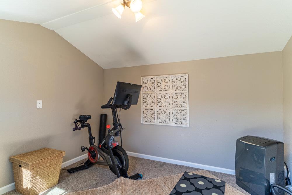 14832 Acton Drive San Jose, CA 95124 - Photo 45 of 47 a room with gym equipment and a view of living room