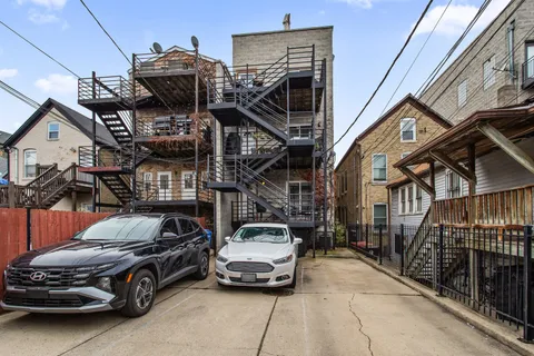 a car parked in front of a house