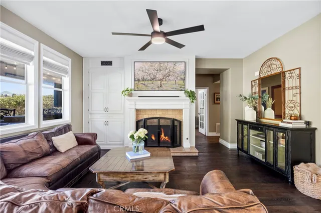 a bathroom with a toilet a sink and a mirror