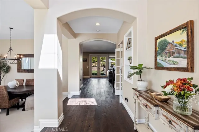 a view of a living room and dining room