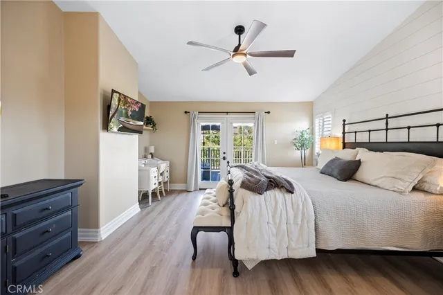 a view of a swimming pool and lounge chairs