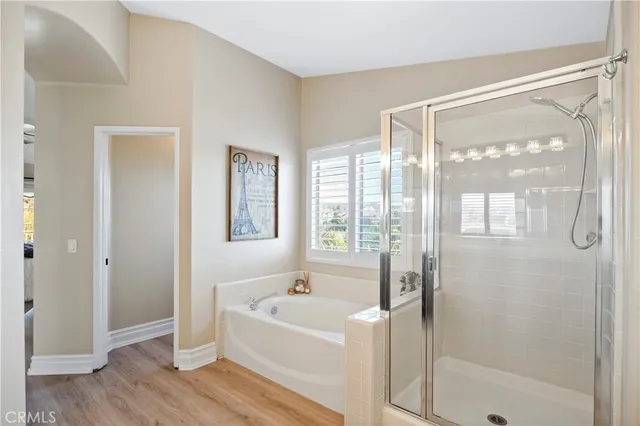 a view of a backyard with wooden fence