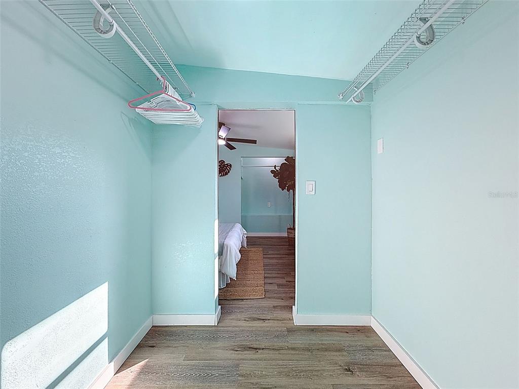 6827 Sanderling Lane Hudson, FL 34667 - Photo 28 of 68 a view of a room with wooden floor