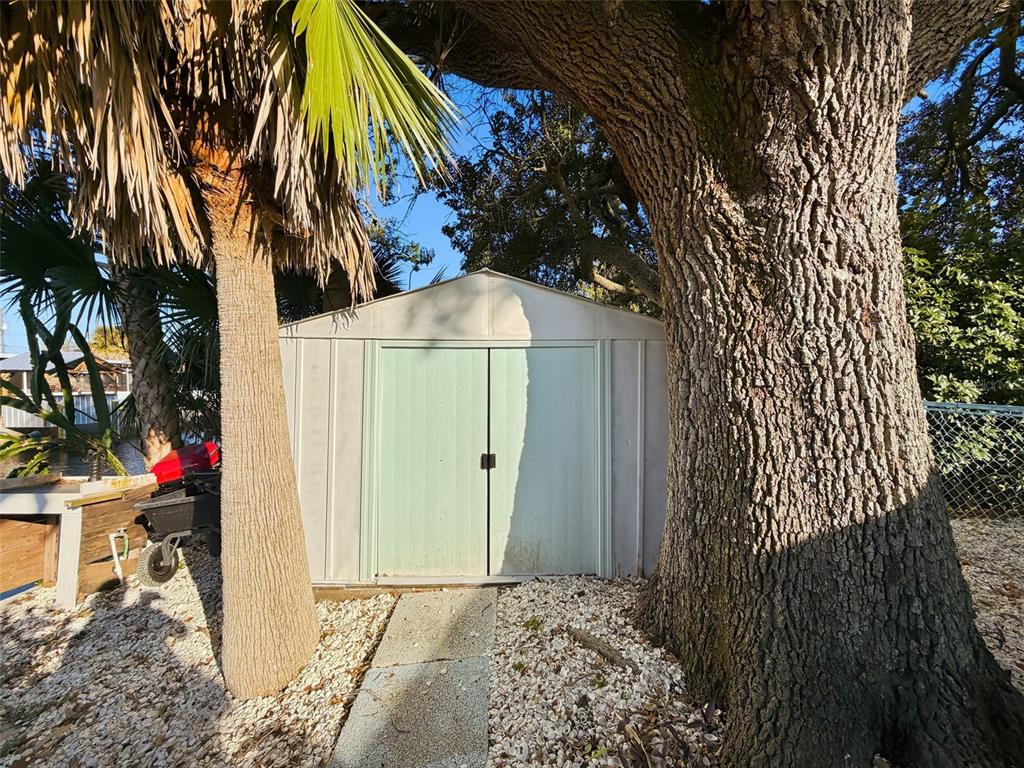 6827 Sanderling Lane Hudson, FL 34667 - Photo 46 of 68 a view of a house with a yard