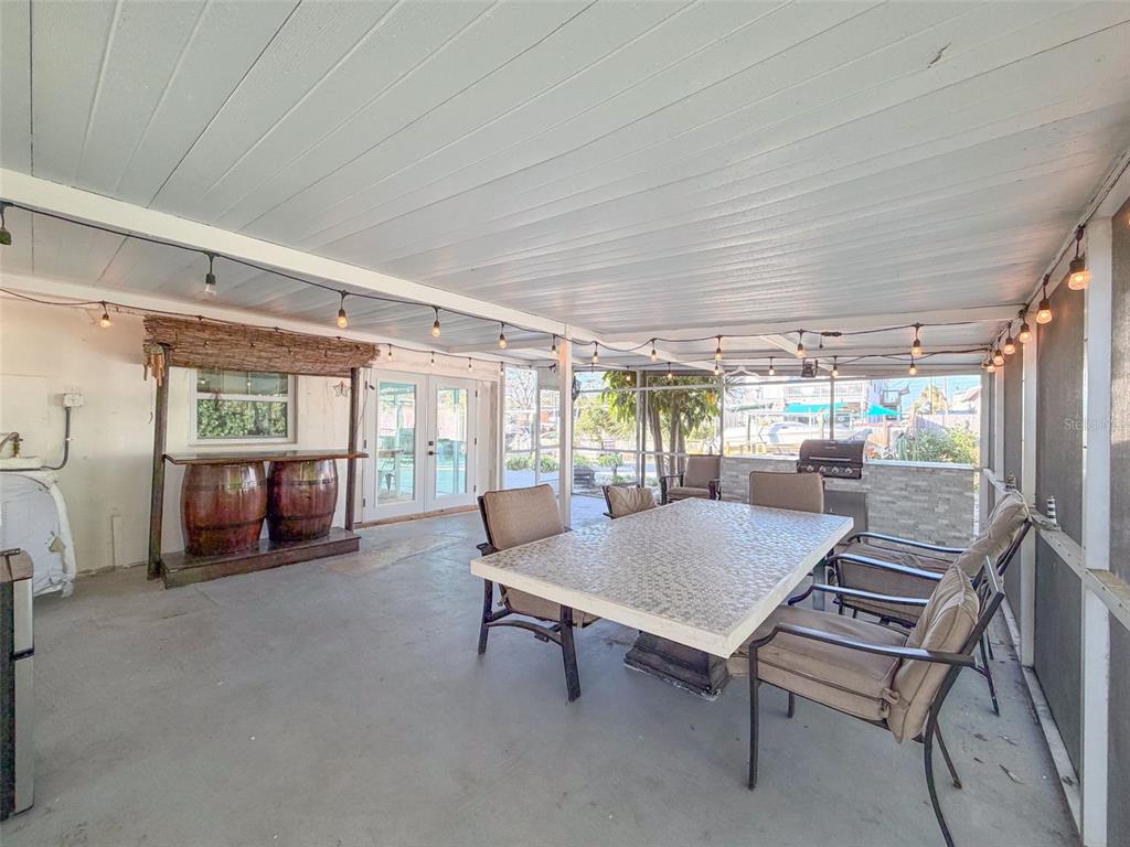 6827 Sanderling Lane Hudson, FL 34667 - Photo 47 of 68 a room with furniture and a table