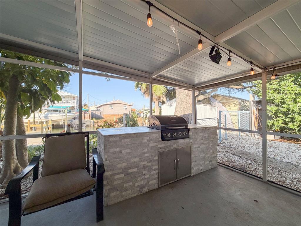 6827 Sanderling Lane Hudson, FL 34667 - Photo 48 of 68 a view of a couches in the patio