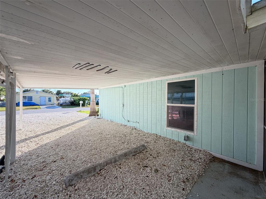 6827 Sanderling Lane Hudson, FL 34667 - Photo 53 of 68 a view of a garage
