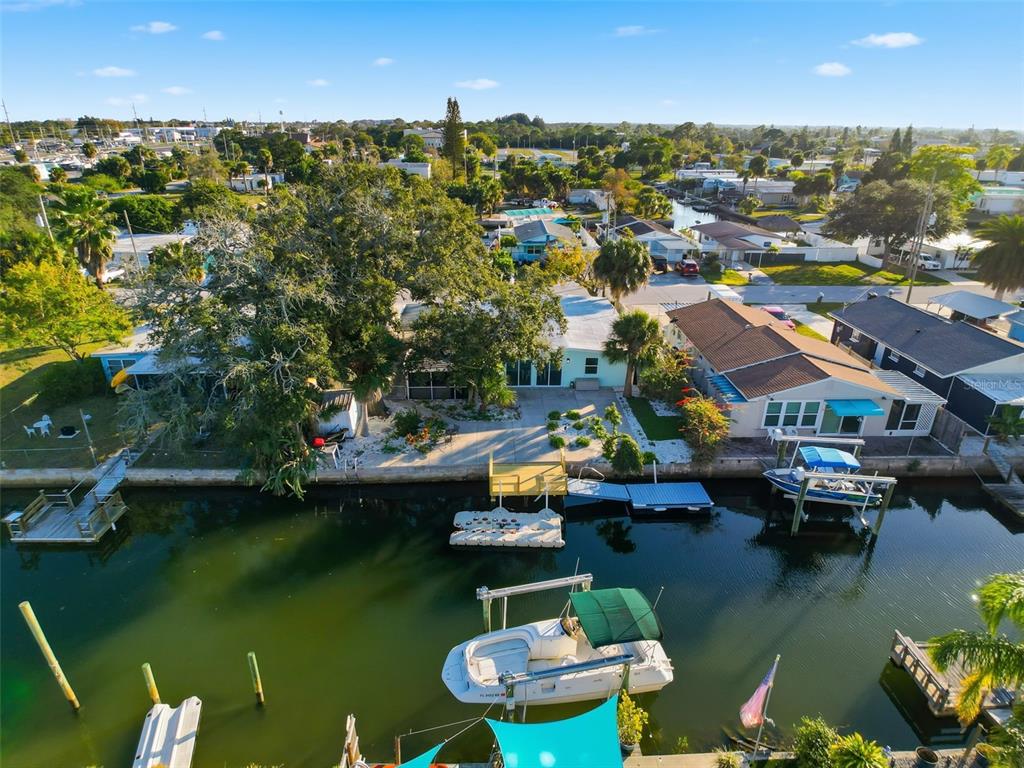 6827 Sanderling Lane Hudson, FL 34667 - Photo 56 of 68 an aerial view of a house with a lake view