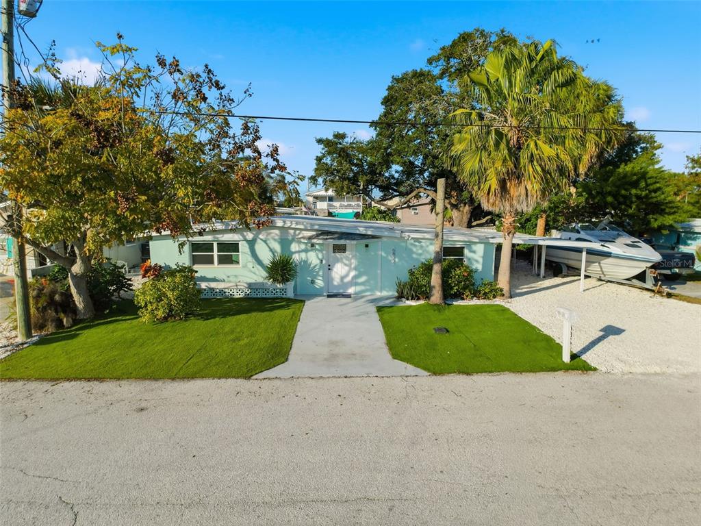 6827 Sanderling Lane Hudson, FL 34667 - Photo 61 of 68 a view of house with outdoor space and street view