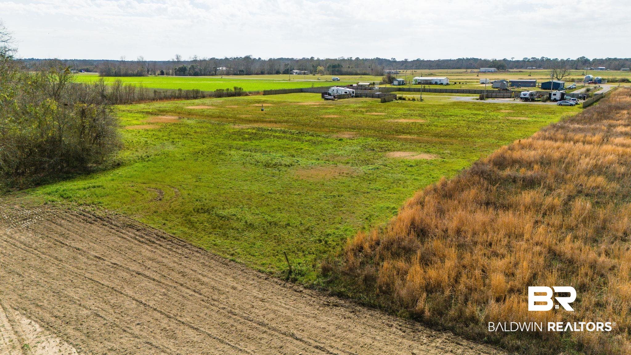 7826 County Road 19 Foley, AL 36535 - Photo 7 of 11 Aerial view of sparsely populated area featuring farmland