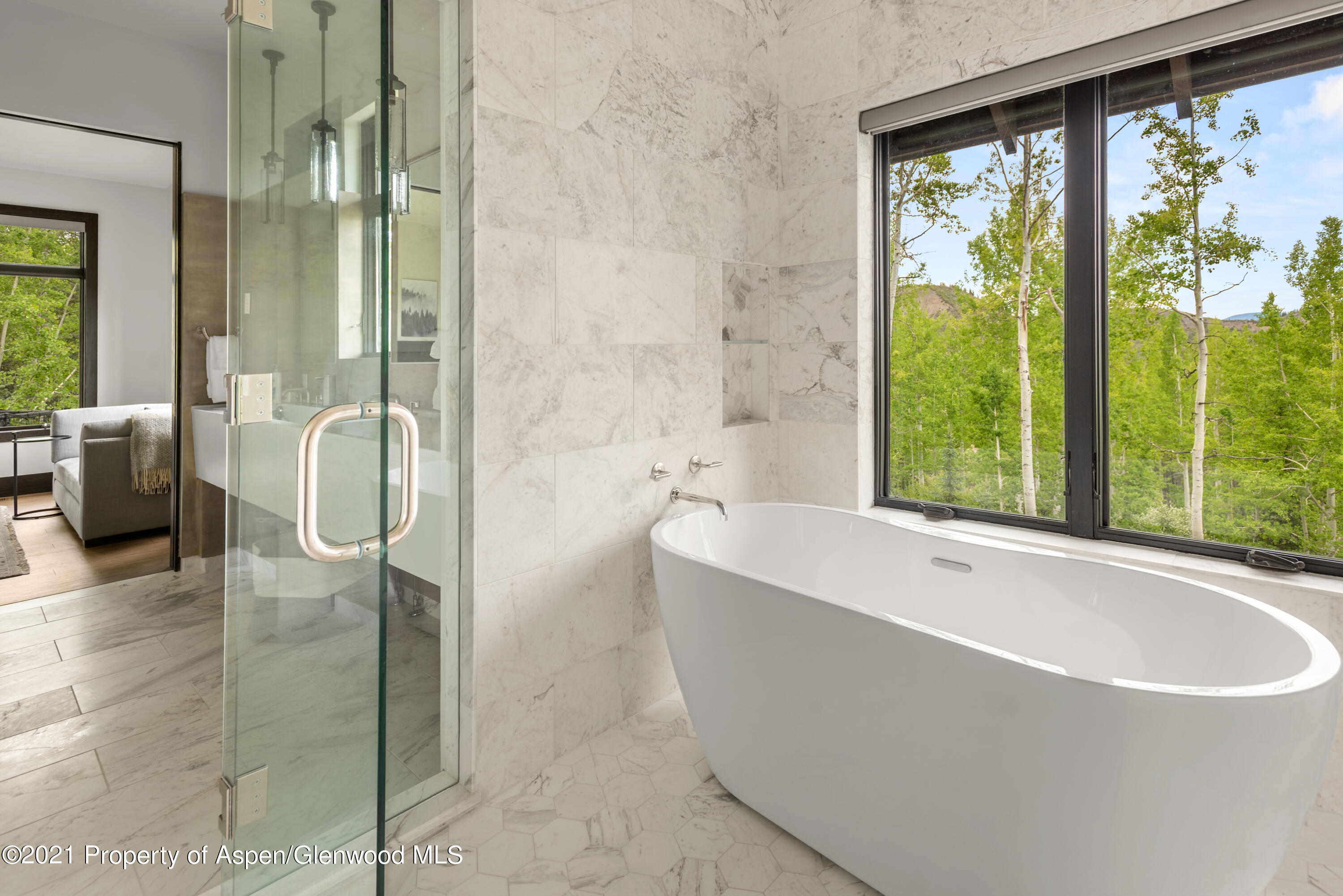 32 Elk Ridge Lane Snowmass Village, CO 81615 - Photo 11 of 34 a bathroom with a bathtub and a shower