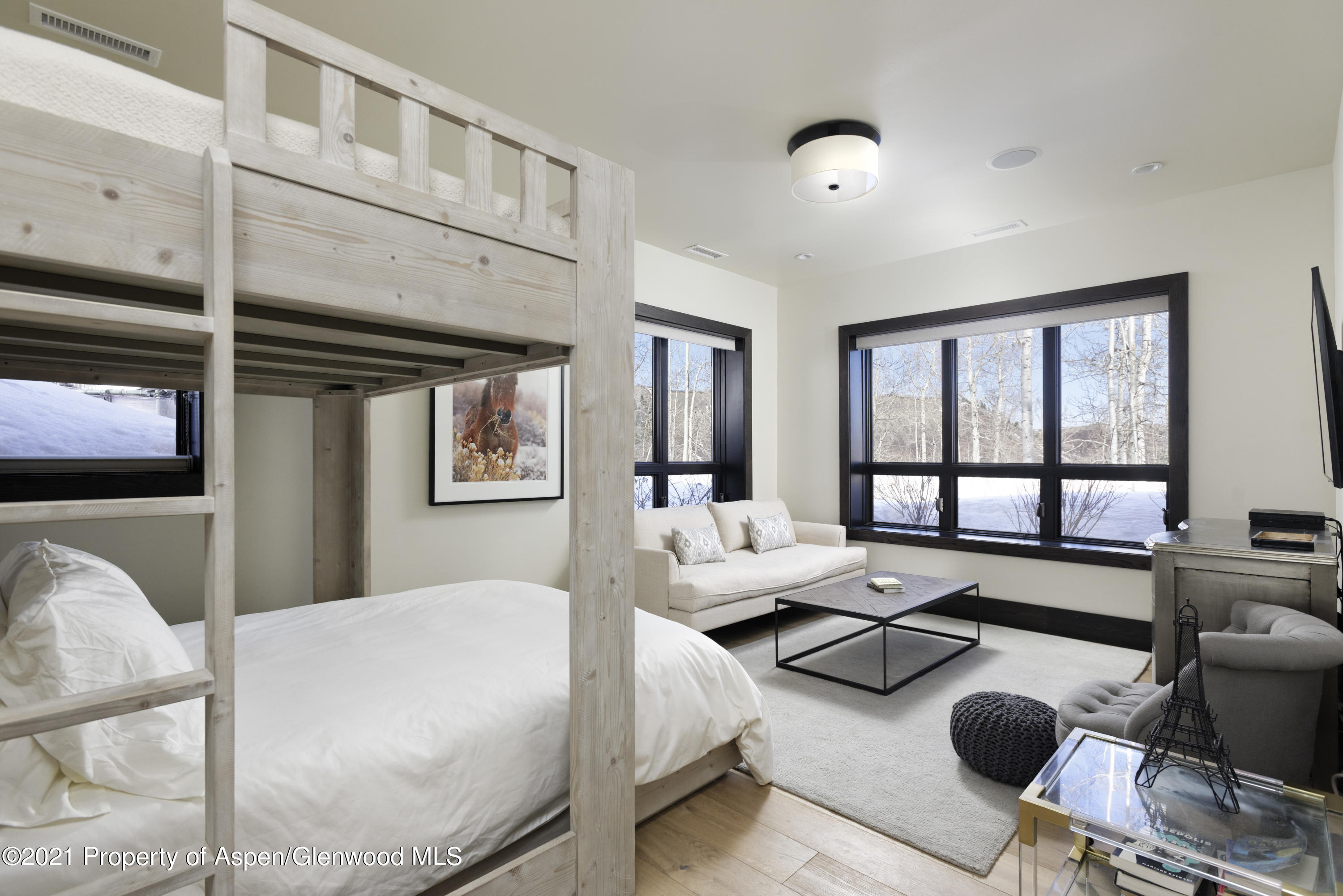 32 Elk Ridge Lane Snowmass Village, CO 81615 - Photo 20 of 34 a bedroom with furniture and a large window