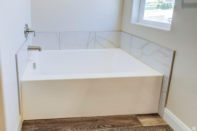 668 East Fiddlers Canyon Road, Unit 24 Cedar City, UT 84721 - Photo 8 of 21 Bathroom featuring a garden tub