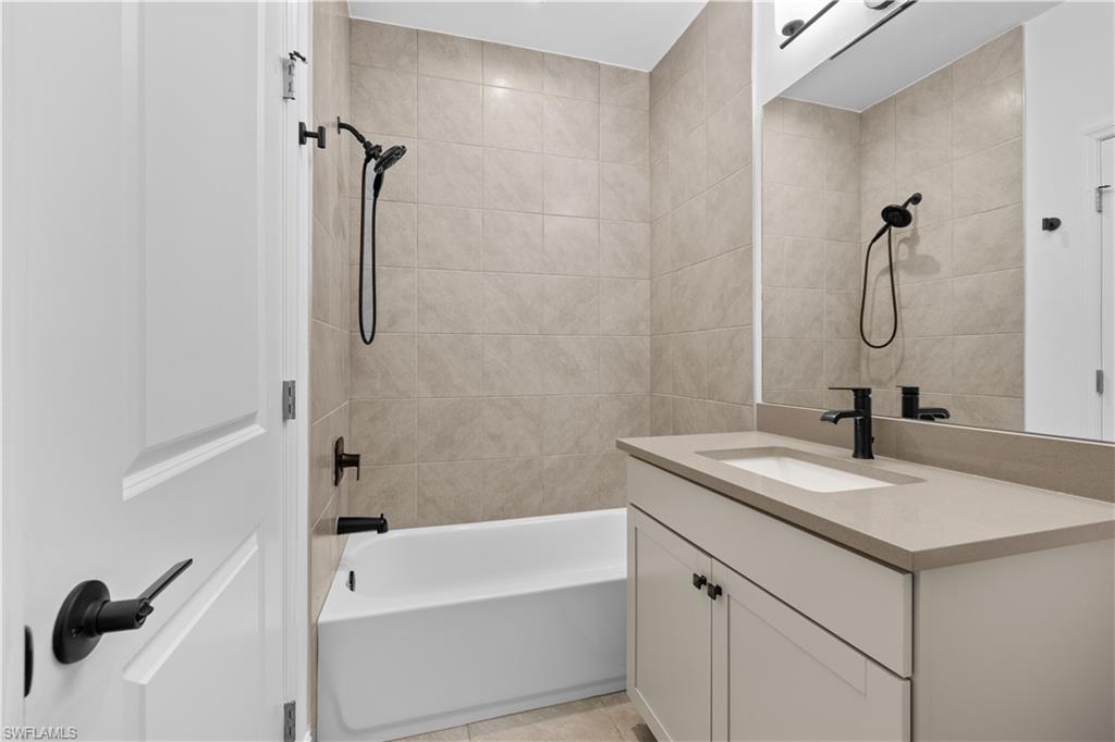 7548 Carnegie Way Naples, FL 34119 - Photo 15 of 20 Guest bathroom
