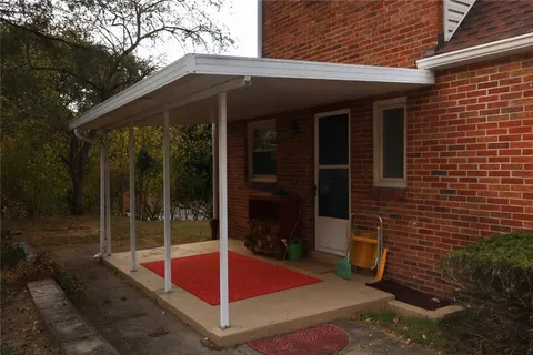 a view of pool with chairs