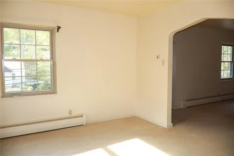 an empty room with windows