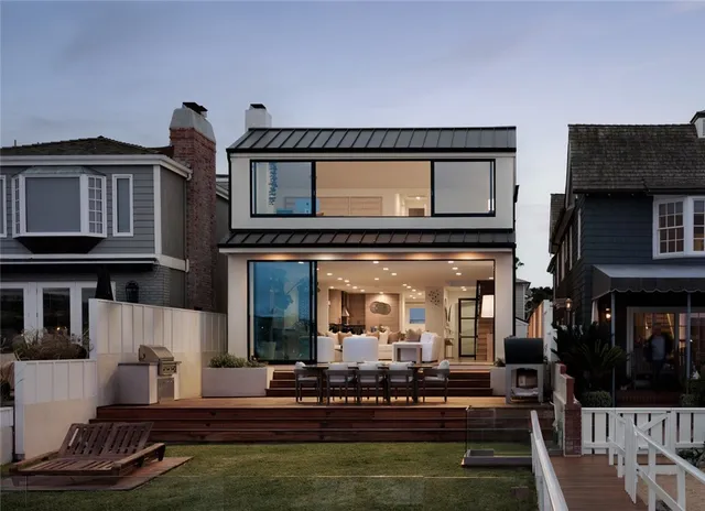 a living room with fireplace furniture and a flat screen tv