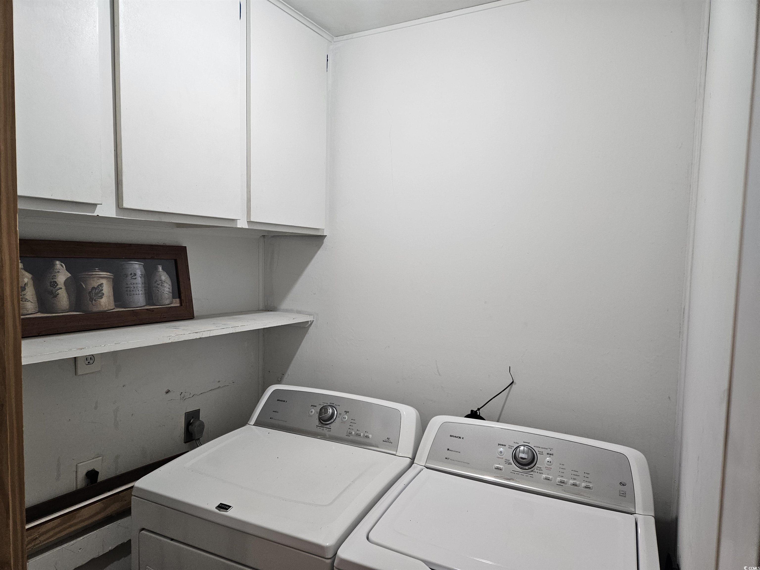 602 Jefferson Way Conway, SC 29526 - Photo 10 of 20 Laundry room featuring cabinet space and washer and clothes dryer
