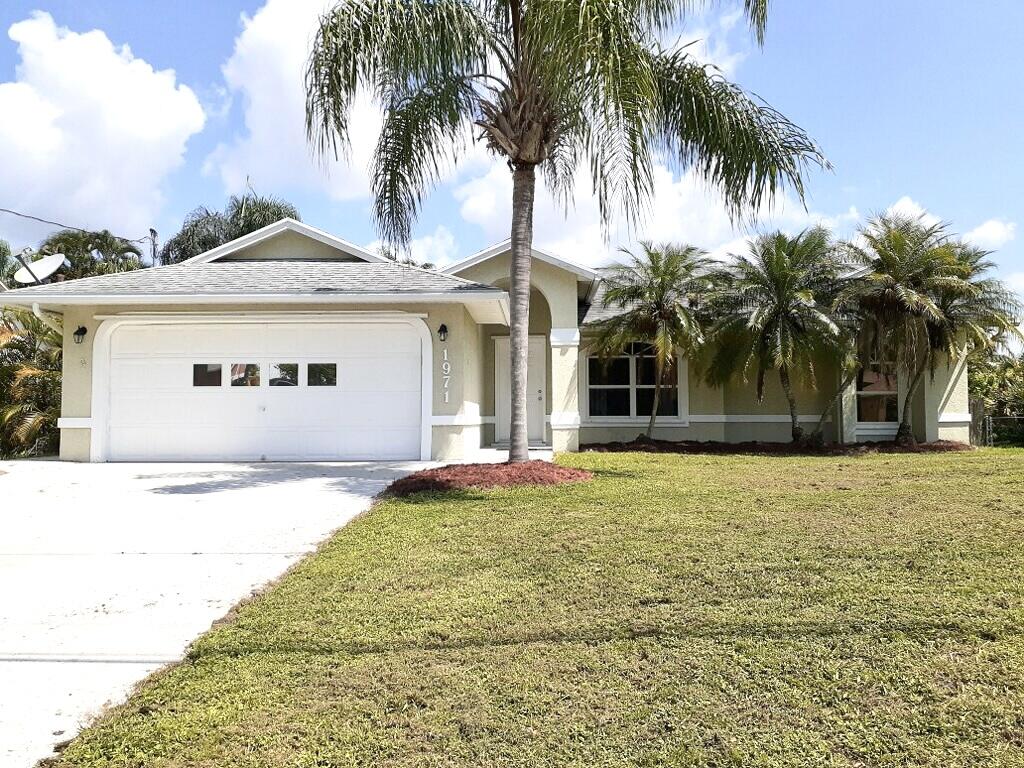 1971 Southwest Leafy Road Port St. Lucie, FL 34953 - Photo 1 of 24 1C739952-B092-4212-A01C-BF24409DF65E