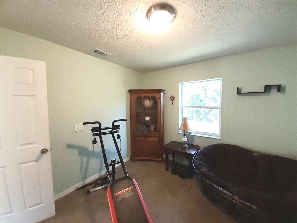 1971 Southwest Leafy Road Port St. Lucie, FL 34953 - Photo 7 of 24 5BA78B0A-67A5-4804-8A84-D9640DD6BD7C