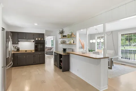 a kitchen with counter top space and appliances