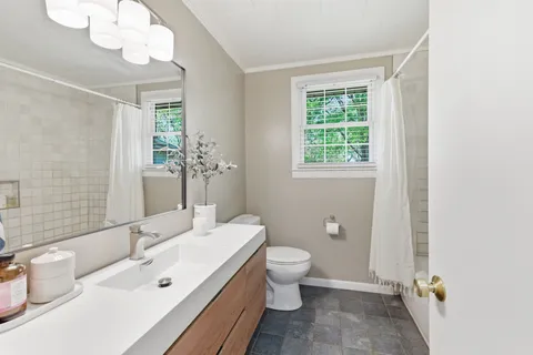 a bathroom with a bathtub