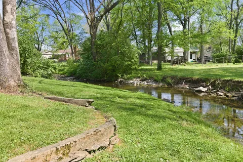 a view of a wooden deck with a bench