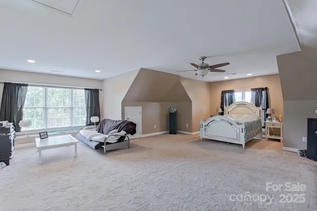 a living room with furniture window and a lamp