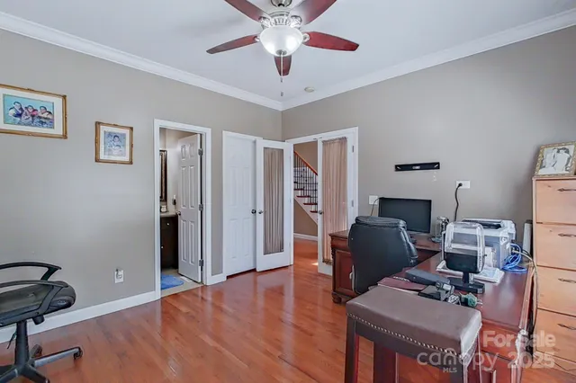 a workspace with furniture and window