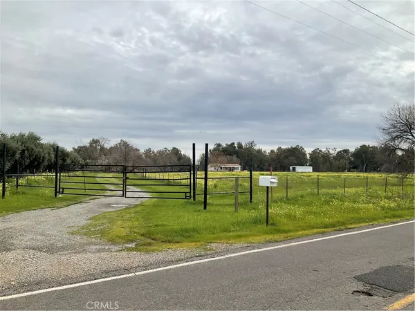 a view of a golf course with a lake view