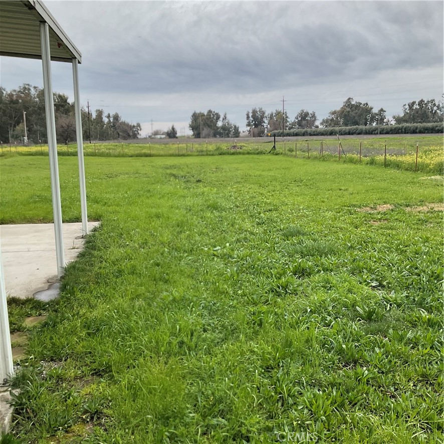 2804 Kirkwood Road Corning, CA 96021 - Photo 4 of 10 a view of a green field with clear sky