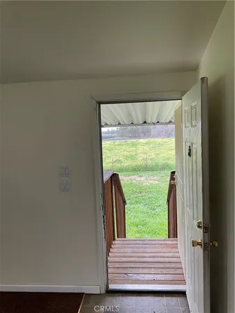 a view of a room with a large window