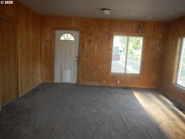 an empty room with windows