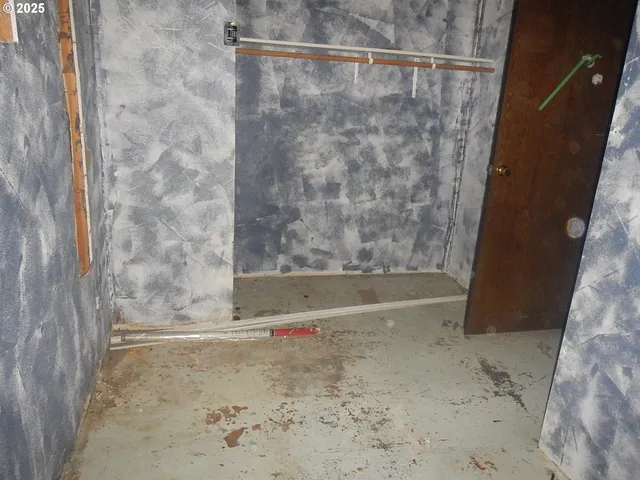a stove top oven sitting inside of a kitchen