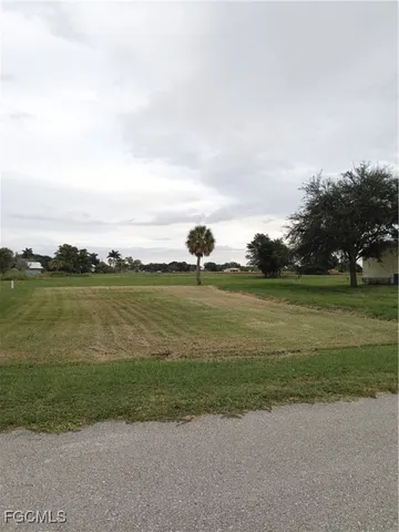 a view of a lake with a big yard