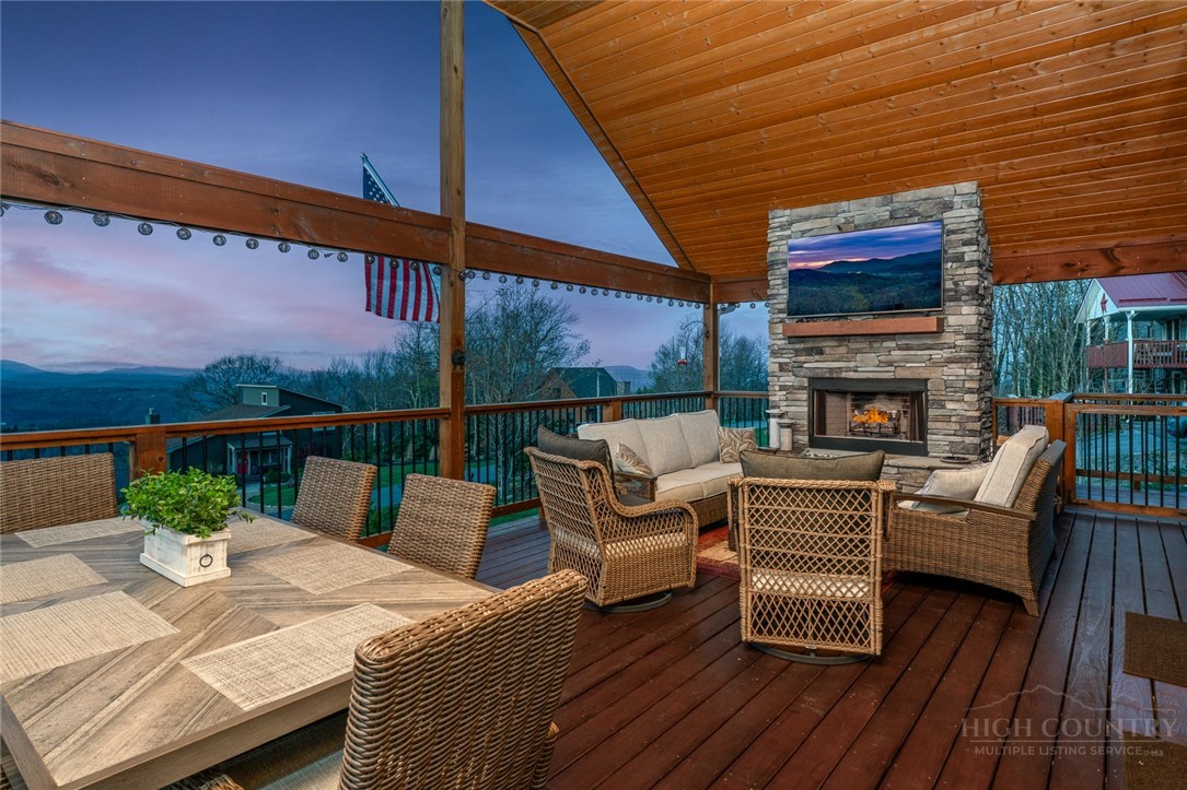 1161 Grandview Dr Extension Boone, NC 28607 - Photo 34 of 43 a outdoor living space with furniture and a fireplace