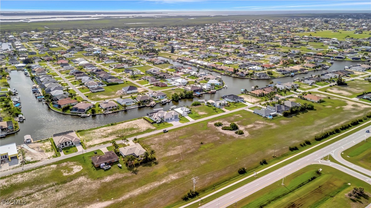 100 Burnt Store Road Cape Coral, FL 33993 - Photo 21 of 21 an aerial view of residential houses with outdoor space