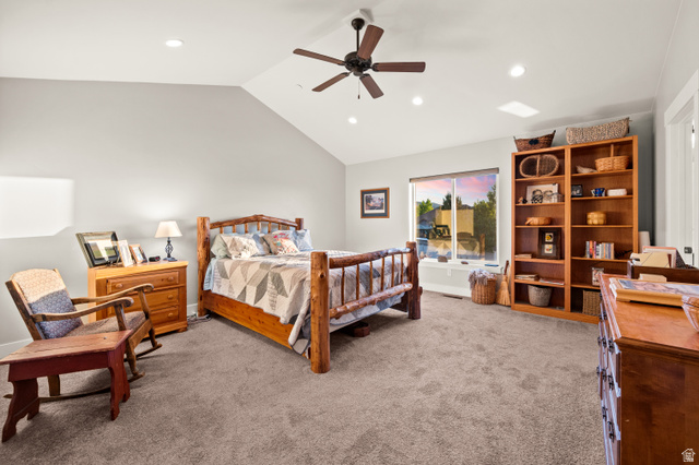 1145 North Christley Lane, Unit 48 Elk Ridge, UT 84651 - Photo 12 of 38 Spacious master bedroom featuring vaulted ceilings, recessed lighting, a ceiling fan, a large window, and built-in shelving