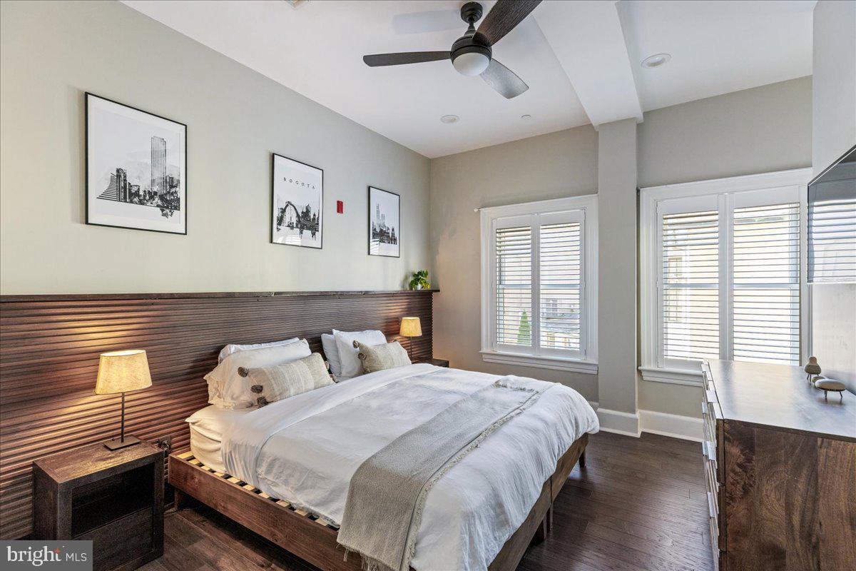 20 East Court Street Doylestown, PA 18901 - Photo 17 of 34 a bedroom with a bed and wooden floor