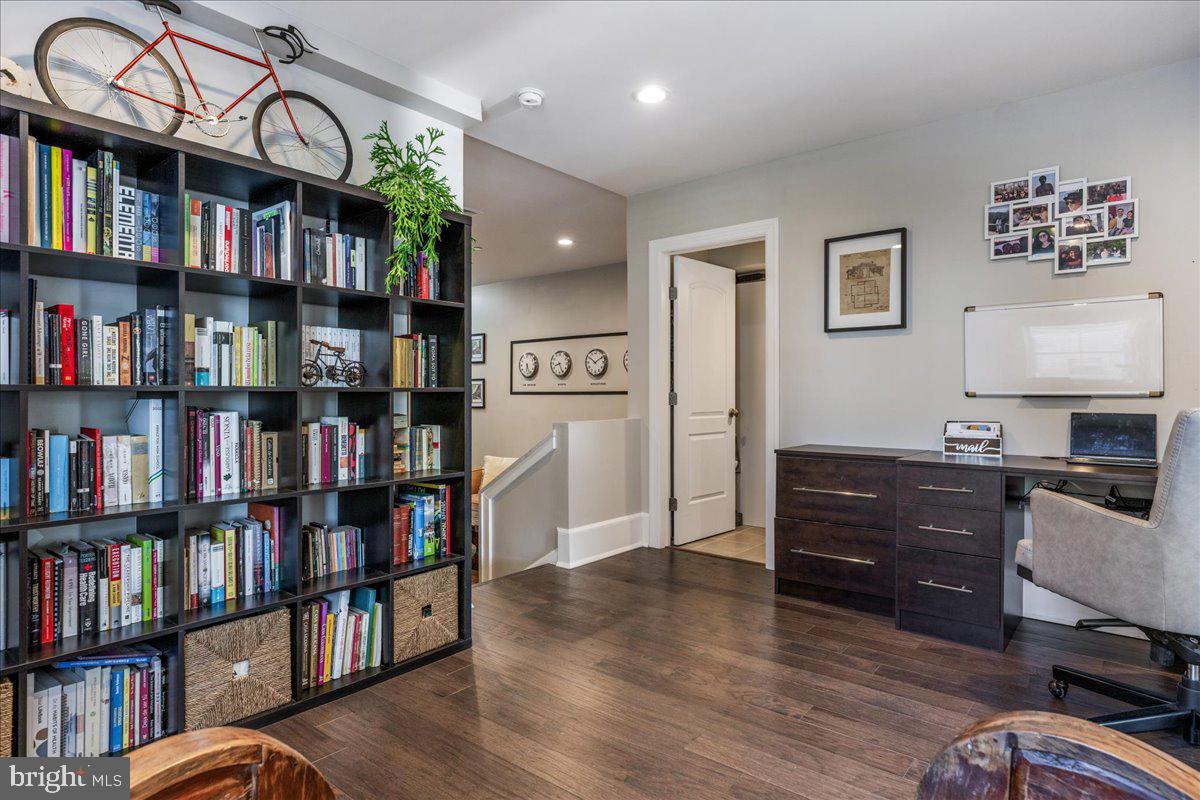 20 East Court Street Doylestown, PA 18901 - Photo 24 of 34 a room with furniture and a book shelf