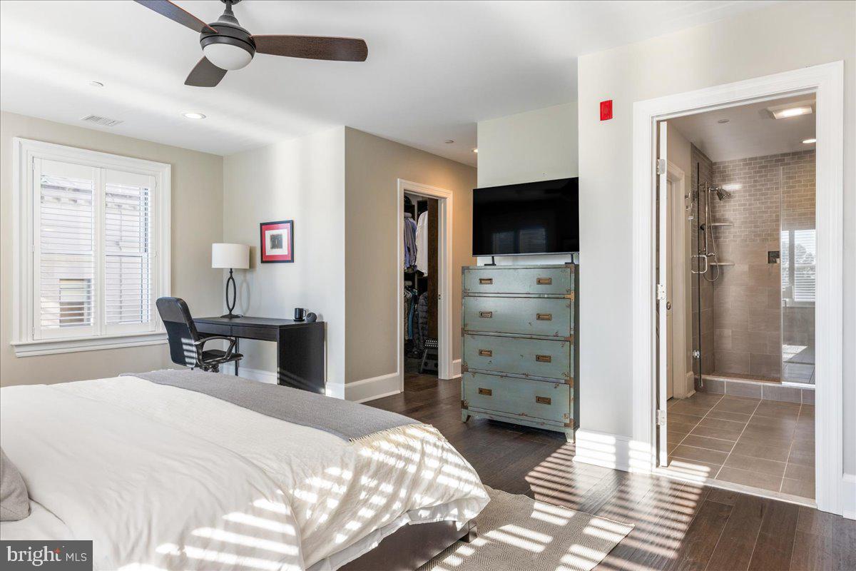 20 East Court Street Doylestown, PA 18901 - Photo 27 of 34 a bed room with a bed and a television
