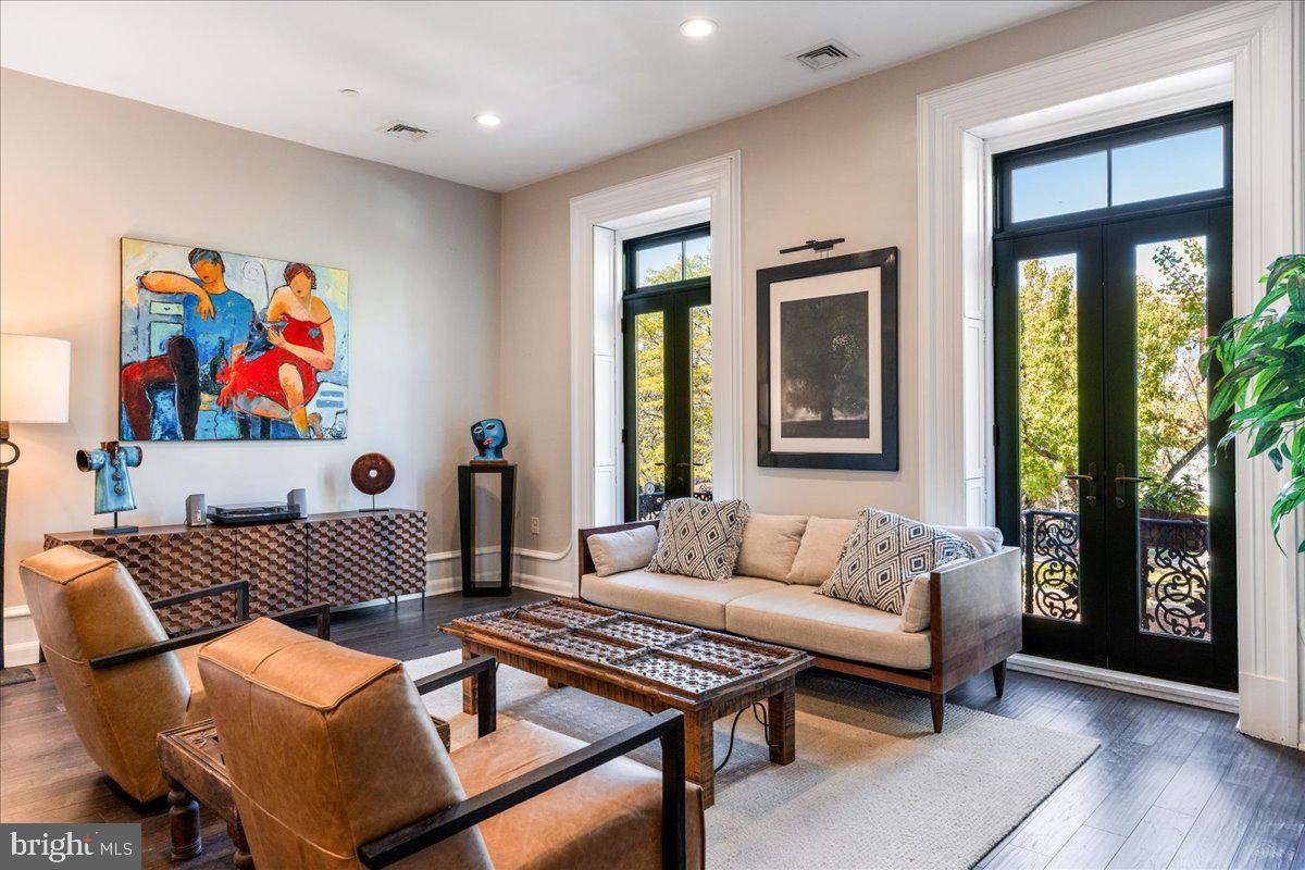20 East Court Street Doylestown, PA 18901 - Photo 5 of 34 a living room with furniture and a potted plant