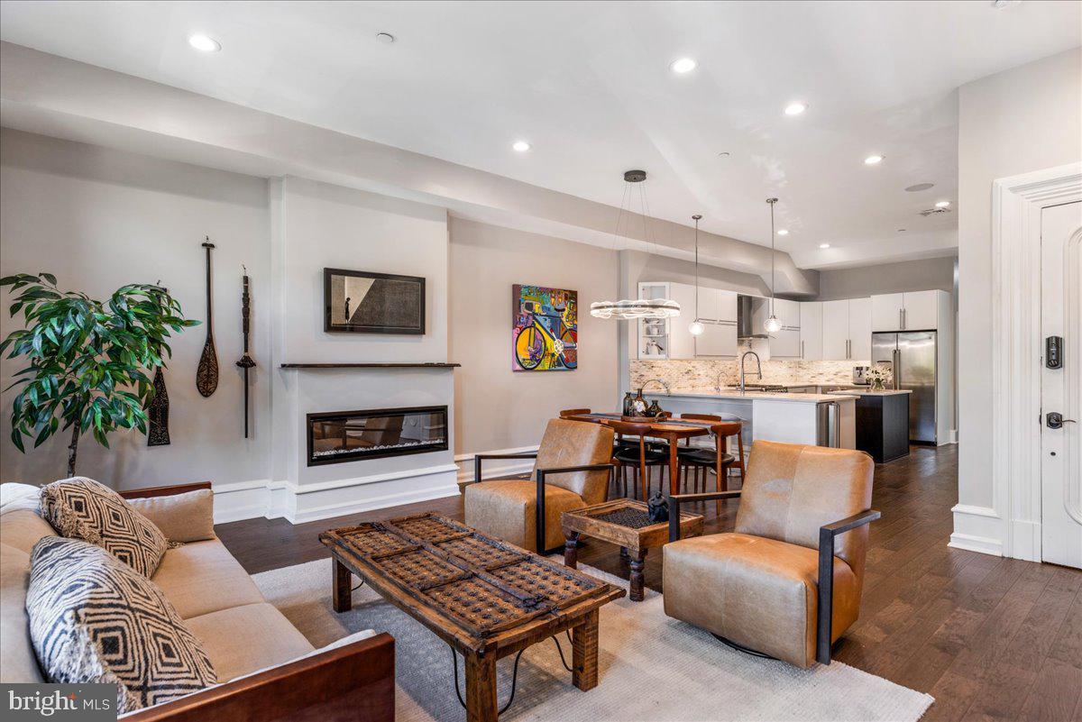 20 East Court Street Doylestown, PA 18901 - Photo 6 of 34 a living room with furniture and a fireplace