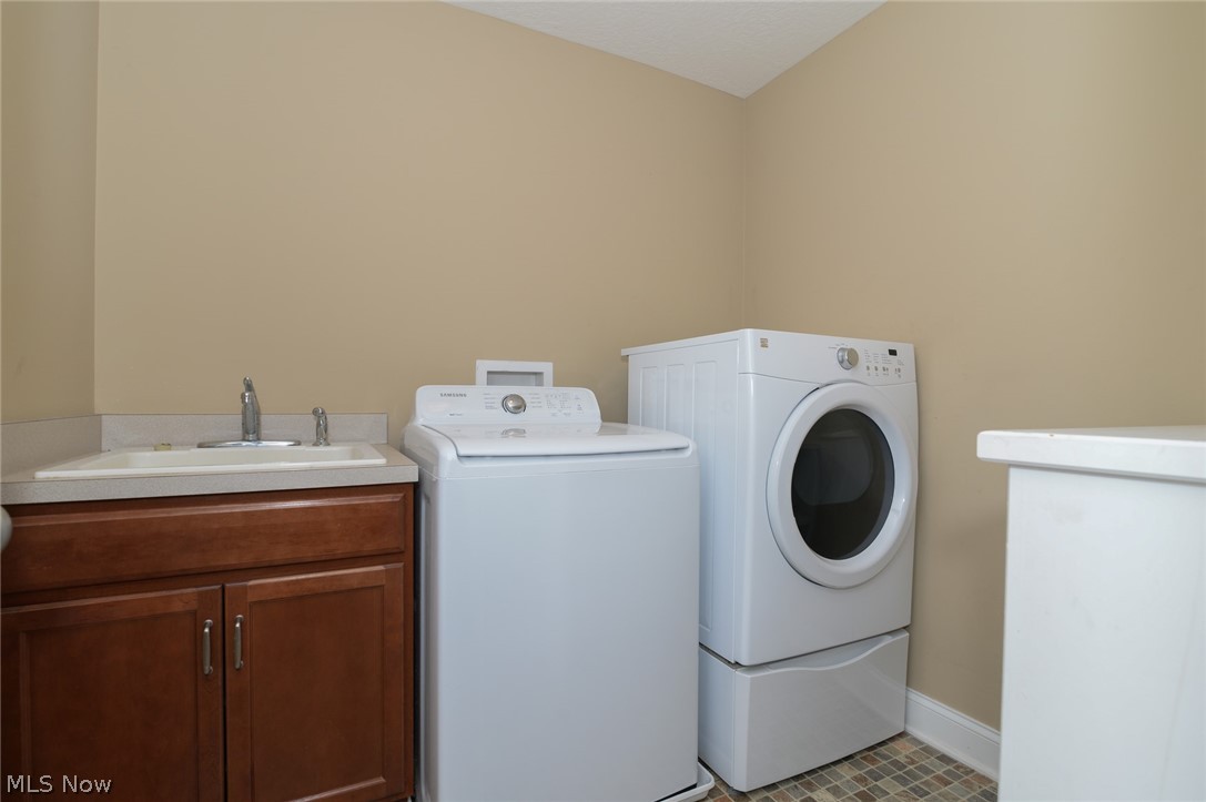 5813 Birmingham Road Northeast Canton, OH 44721 - Photo 14 of 32 Second floor laundry room