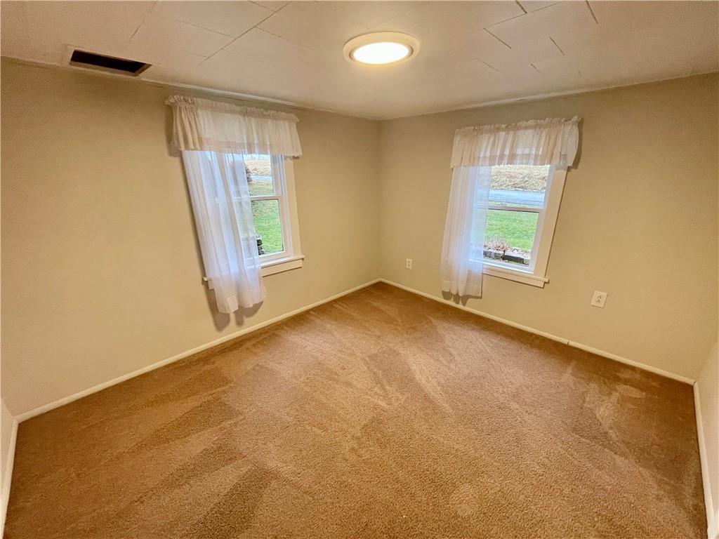 1121 School Road Apollo, PA 15613 - Photo 17 of 30 an empty room with windows
