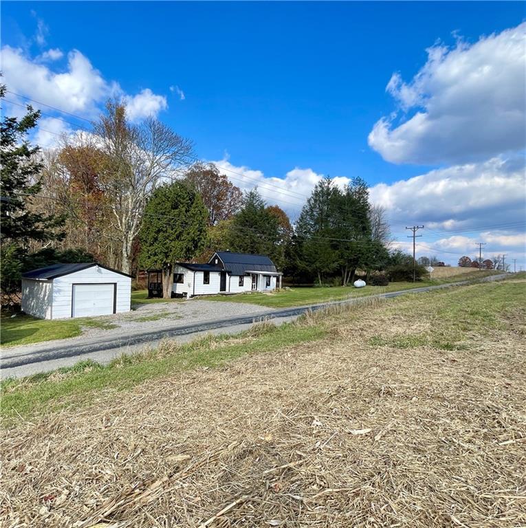 1121 School Road Apollo, PA 15613 - Photo 30 of 30 a view of a house with a yard